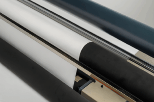 Automatic feeding machine for laser cutting with tension control system