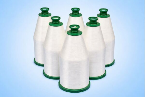 Fiberglass yarn wound on industrial spools for high-temperature filtration applications