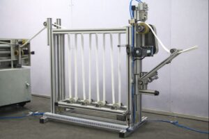 Bead-Accumulator system for filter bag bead sewing, enabling continuous bead feeding and consistent sewing stability